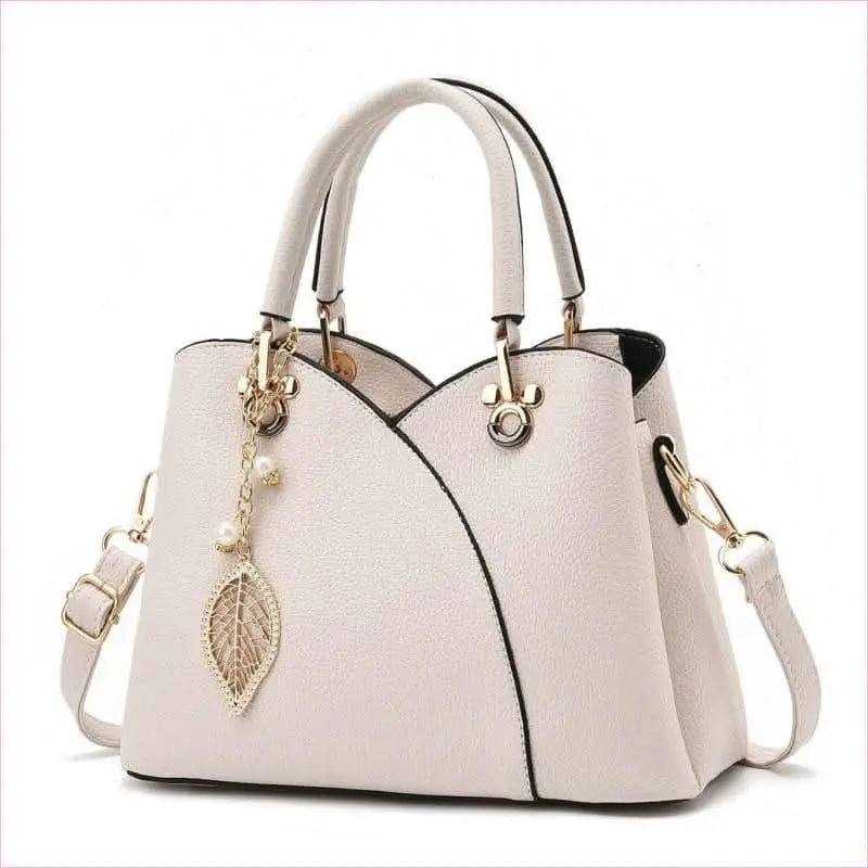 Trendy Versatile Women's Handbag with Glamorous Gold and Pearl Details Pleasures and Sins